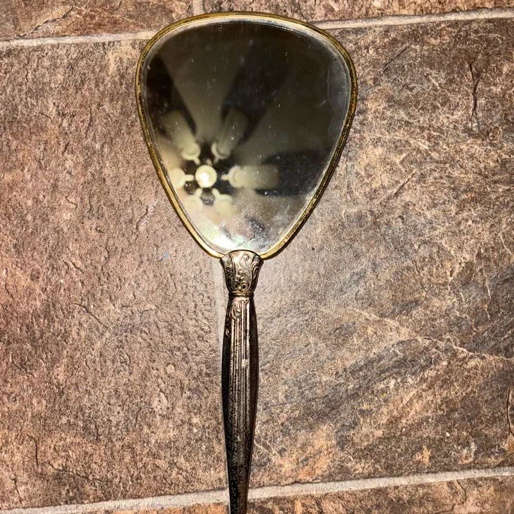 Vintage Handheld Mirror with Gold Accents